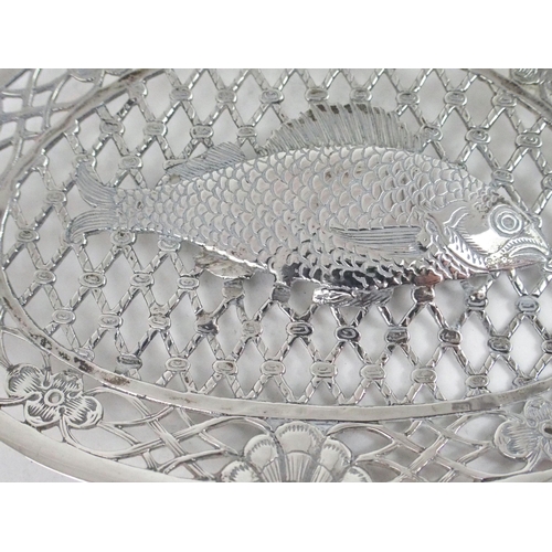 2462 - A DUTCH SILVER FISH SLICEthe bowl of reticulated oval form resembling a fish caught in a net, surrou... 