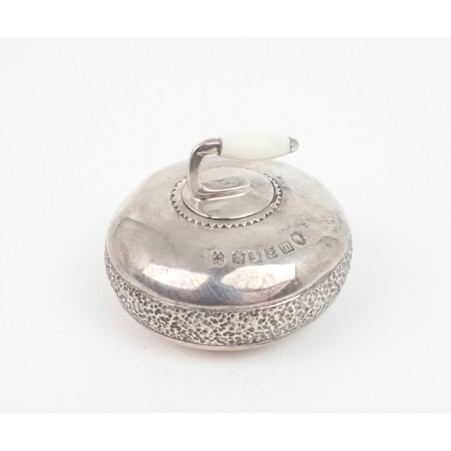 2468 - A GEORGE V NOVELTY SILVER PAPERWEIGHTmodelled as a curling stone, with inscription 'The Twenty Curli... 