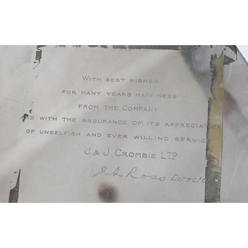 2490 - A GEORGE V SILVER SALVERof plain form, with a chippendale pie crust border, engraved to the centre '... 