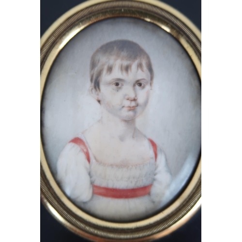 2598 - THREE REGENCY PORTRAIT MINIATURES PAINTED ON IVORYIn ebonised frames, comprising a lady with ringlet... 