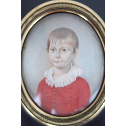 2598 - THREE REGENCY PORTRAIT MINIATURES PAINTED ON IVORYIn ebonised frames, comprising a lady with ringlet... 