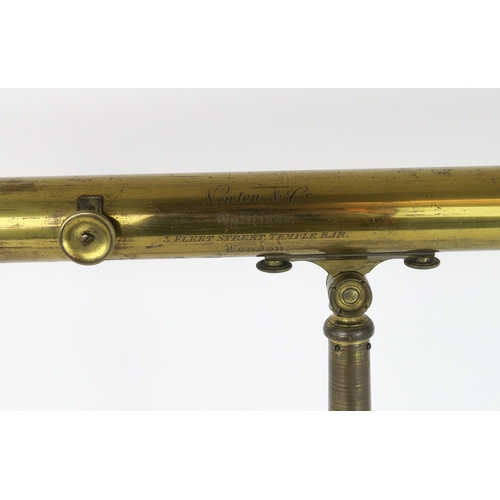 2600 - A VICTORIAN LACQUERED BRASS TELESCOPE ON TRIPOD BASE BY NEWTON & Co., FLEET STREET, LONDONIn mah... 