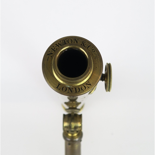 2600 - A VICTORIAN LACQUERED BRASS TELESCOPE ON TRIPOD BASE BY NEWTON & Co., FLEET STREET, LONDONIn mah... 