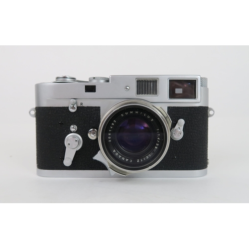 2613A - A 1964 LEITZ LEICA M2 RANGEFINDER CAMERA FITTED WITH A LEITZ SUMMILUX 1:1.4/35 LENSSerial no. 109861... 