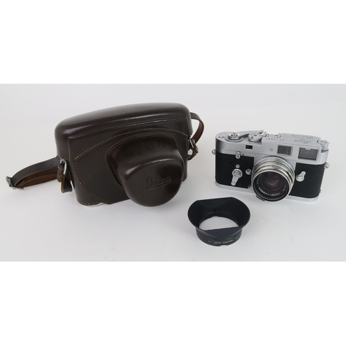 2613A - A 1964 LEITZ LEICA M2 RANGEFINDER CAMERA FITTED WITH A LEITZ SUMMILUX 1:1.4/35 LENSSerial no. 109861... 