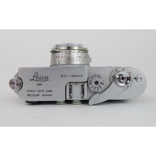 2613A - A 1964 LEITZ LEICA M2 RANGEFINDER CAMERA FITTED WITH A LEITZ SUMMILUX 1:1.4/35 LENSSerial no. 109861... 