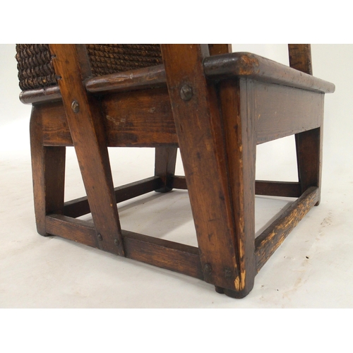 2002 - AN EARLY 20TH CENTURY OAK FRAMED ORKNEY CHAIRwith rushed back over replacement square rushed seat on... 