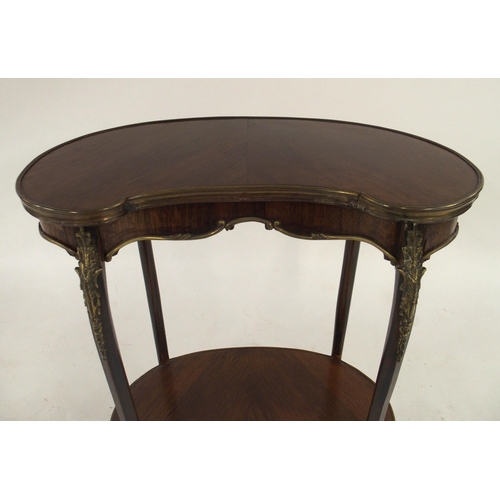 2003 - A LOUIS XV STYLE KINGWOOD TWO TIER KIDNEY SHAPED OCCASIONAL TABLEwith gilt brass ormolu mounts to ta... 