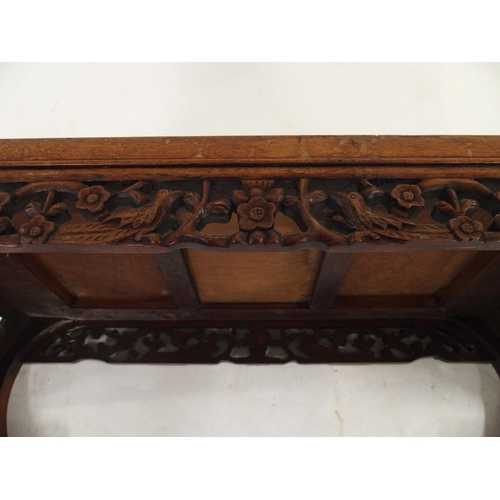 2005 - A 20TH CENTURY CHINESE HARDWOOD LOW TABLEwith central birds eye maple panel, carved floral fretwork ... 