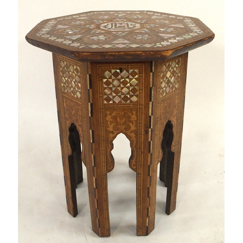 2009 - AN EARLY 20TH CENTURY MOORISH STYLE SEWING TABLE IN THE MANNER OF LIBERTY OF LONDONwith octagonal hi... 