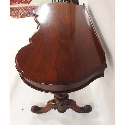 2017 - A VICTORIAN MAHOGANY CONSOLE TABLEwith shaped top on stretchered pedestal supports with out swept fe... 