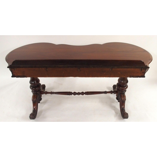 2017 - A VICTORIAN MAHOGANY CONSOLE TABLEwith shaped top on stretchered pedestal supports with out swept fe... 