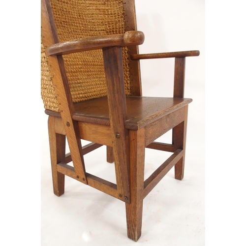 2020 - A 19TH CENTURY OAK FRAMED ORKNEY CHAIRwith rushed back and shaped arms on stretchered square support... 