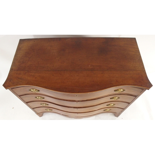 2028 - A GEORGIAN MAHOGANY SERPENTINE FRONT CHEST OF FOUR DRAWERSwith satinwood inlays to sides and lower f... 