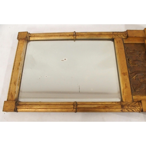 2033 - A 19TH CENTURY GILTWOOD AND GESSO FRAMED BEVELLED GLASS WALL MIRRORwith moulded cornice with applied... 