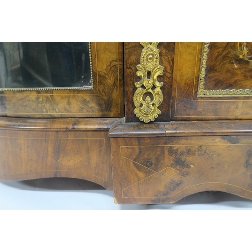 2045 - A VICTORIAN BURR WALNUT AND SATINWOOD INLAID CREDENZAwith central cabinet door flanked by curved gla... 