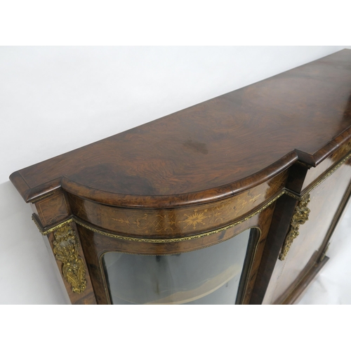 2045 - A VICTORIAN BURR WALNUT AND SATINWOOD INLAID CREDENZAwith central cabinet door flanked by curved gla... 