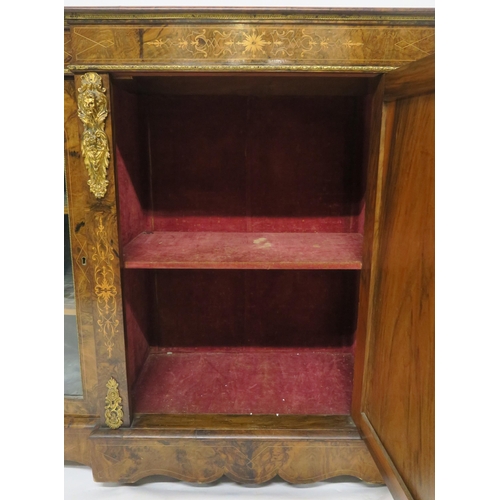 2045 - A VICTORIAN BURR WALNUT AND SATINWOOD INLAID CREDENZAwith central cabinet door flanked by curved gla... 