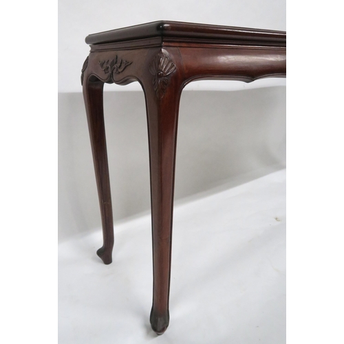 2048 - A 20TH CENTURY HARDWOOD ORIENTAL STYLE ALTAR TABLEwith rectangular top over shaped friezes on cabrio... 