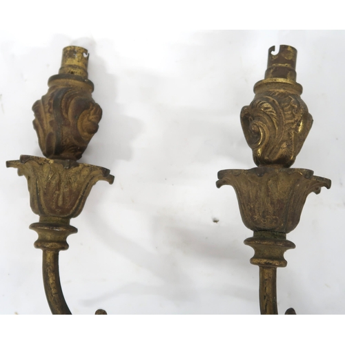 2066 - A LOT OF FIVE ROCOCO STYLE GILT METAL ORMOLU TWO BRANCH WALL SCONCESwith scroll and acanthus back pl... 