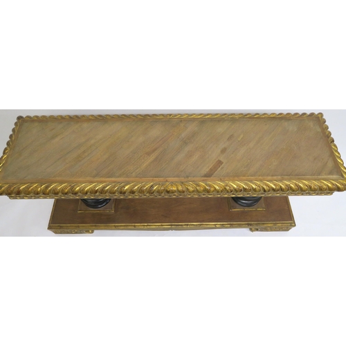 2103 - A 20TH CENTURY GILTWOOD AND MAHOGANY ALTAR TABLEwith parquetry top over carved giltwood friezes on t... 