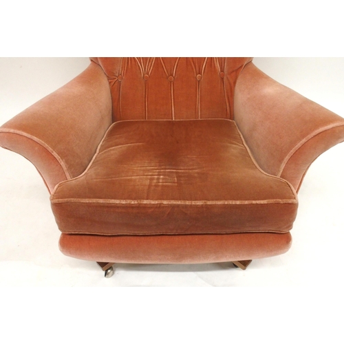 2106 - A MID 20TH CENTURY G PLAN MODEL 6250 SWIVEL WING BACK ARMCHAIRwith pick velour button back upholster... 