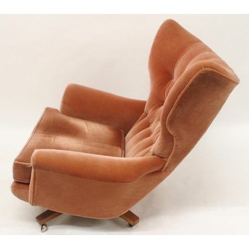 2106 - A MID 20TH CENTURY G PLAN MODEL 6250 SWIVEL WING BACK ARMCHAIRwith pick velour button back upholster... 