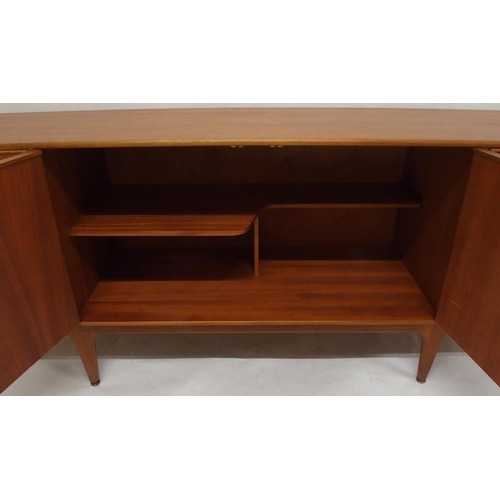 2108 - A MID 20TH CENTURY TEAK A.H. MCINTOSH OF KIRKCALDY SIDEBOARDwith pair of cabinet doors flanked by th... 