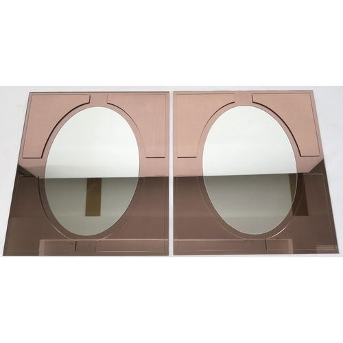 2114 - A PAIR OF 20TH CENTURY ART DECO STYLE FRAMELESS WALL MIRRORSwith central oval mirror mounted on rect... 