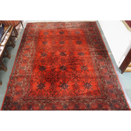 2144 - A DARK RED GROUND AXMINSTER STYLE RUGwith all-over design, multicoloured geometric borders, 366cm lo... 