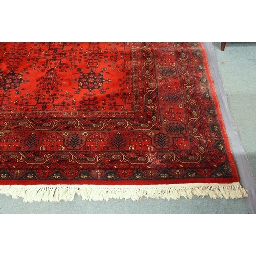 2144 - A DARK RED GROUND AXMINSTER STYLE RUGwith all-over design, multicoloured geometric borders, 366cm lo... 