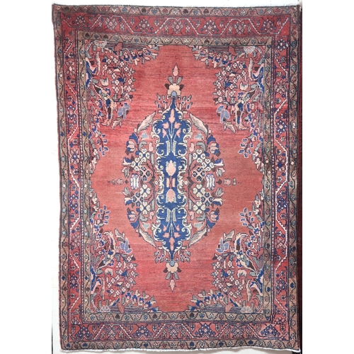 2146 - A LIGHT RED GROUND MAHAL RUGwith floral multicoloured central medallion, matching spandrels and flow... 