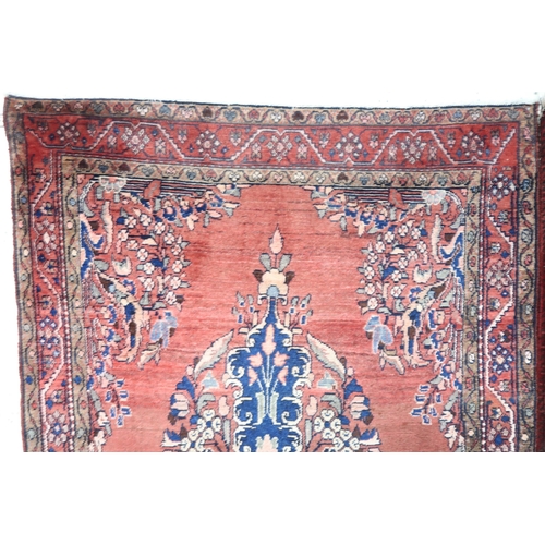 2146 - A LIGHT RED GROUND MAHAL RUGwith floral multicoloured central medallion, matching spandrels and flow... 