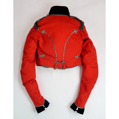 2651 - A RARE YEOMANRY CAVALRY TUNIC, CIRCA 1820The scarlet wool body with black velvet facings to the high... 