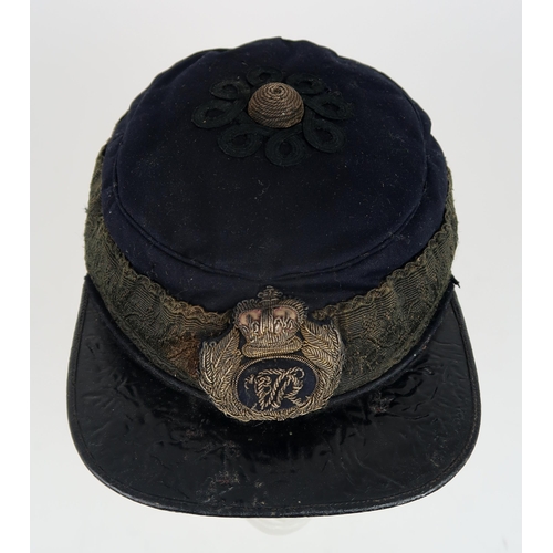 2653 - A VICTORIAN GENERAL SERVICE KEPI/FORAGE CAPWith patent leather peak, cord central boss, broad lace b... 