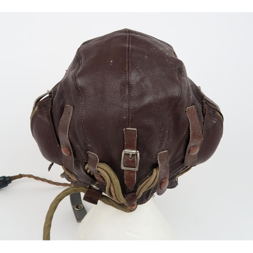 2662 - A WW2 RAF TYPE C (WIRED) LEATHER FLYING HELMET AND RESPIRATORSize no. 4, chamois leather and velvet-... 