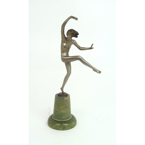 2153 - IN THE STYLE OF JOSEF LORENZL a silvered Art Deco figure of a girl balancing on one foot w... 