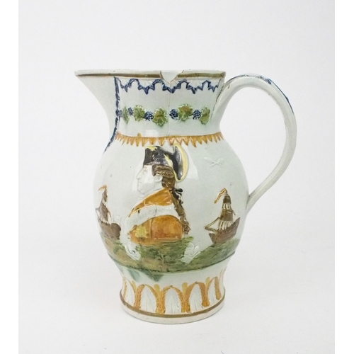 2167A - A COMMEMORATIVE PRATT WARE JUGcirca 1797, moulded to one side with a profile portrait Admiral D... 