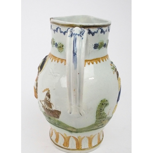 2167A - A COMMEMORATIVE PRATT WARE JUGcirca 1797, moulded to one side with a profile portrait Admiral D... 