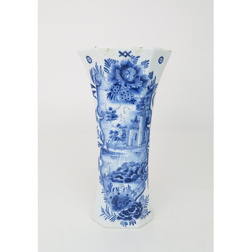 2169 - A 19TH CENTURY DUTCH DELFT VASE of flaring trumpet form, painted with a building in a landscape with... 