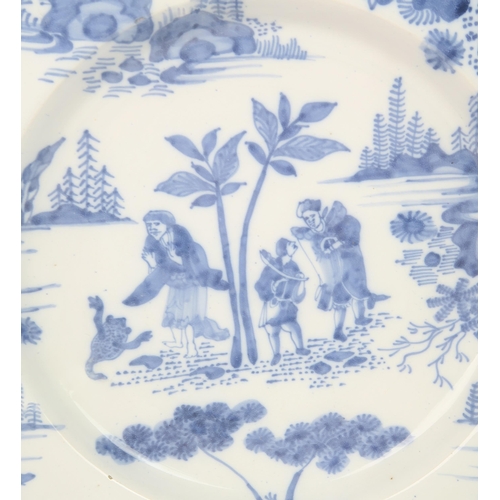 2170 - AN 18TH CENTURY DELFT CHARGERpossibly north German Hanau, painted in blue and white with figure... 