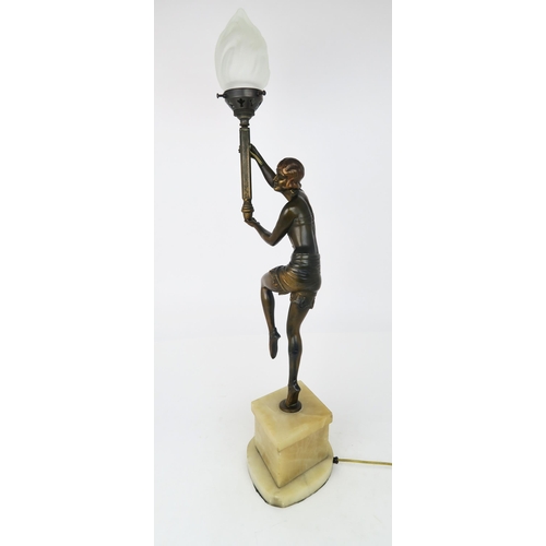 2177 - AN ART DECO LADY LAMPmodelled standing on tip toes, with one knee and both arms raised, the arms sup... 