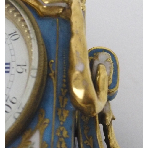 2191 - A SEVRES STYLE PORCELAIN MANTLE CLOCKthe circular white enamel dial, with blue roman numerals and mi... 