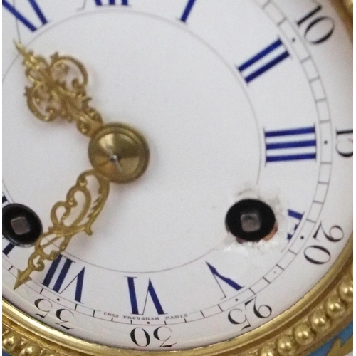 2191 - A SEVRES STYLE PORCELAIN MANTLE CLOCKthe circular white enamel dial, with blue roman numerals and mi... 