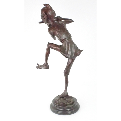 2193 - A LARGE BRONZE OF A PIXIEmodelled standing on one leg playing a pipe, upon circular marble base, 79c... 