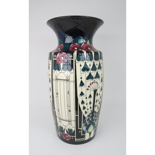 2195 - A COLOSSAL MOORCROFT PRETIGE DESIGN GLASGOW PEACOCK VASEcirca 2018, designed by Nicola Slaney, the b... 