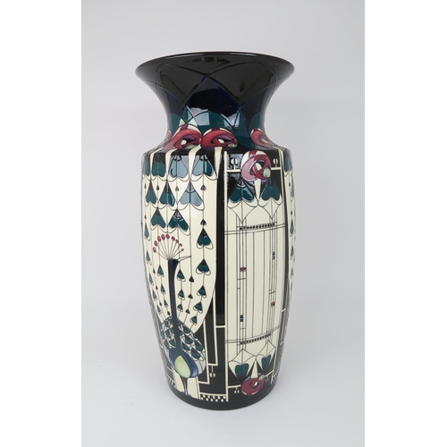 2195 - A COLOSSAL MOORCROFT PRETIGE DESIGN GLASGOW PEACOCK VASEcirca 2018, designed by Nicola Slaney, the b... 