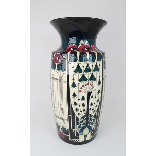 2195 - A COLOSSAL MOORCROFT PRETIGE DESIGN GLASGOW PEACOCK VASEcirca 2018, designed by Nicola Slaney, the b... 