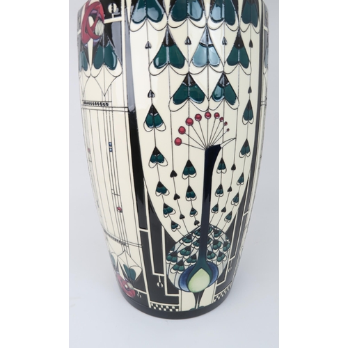 2195 - A COLOSSAL MOORCROFT PRETIGE DESIGN GLASGOW PEACOCK VASEcirca 2018, designed by Nicola Slaney, the b... 