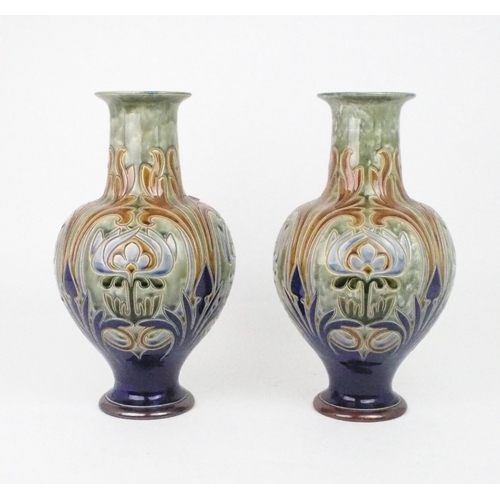 2202 - A PAIR OF ROYAL DOULTON VASES designed by Frank A Butler, of bulbous form with flaring neck decorate... 